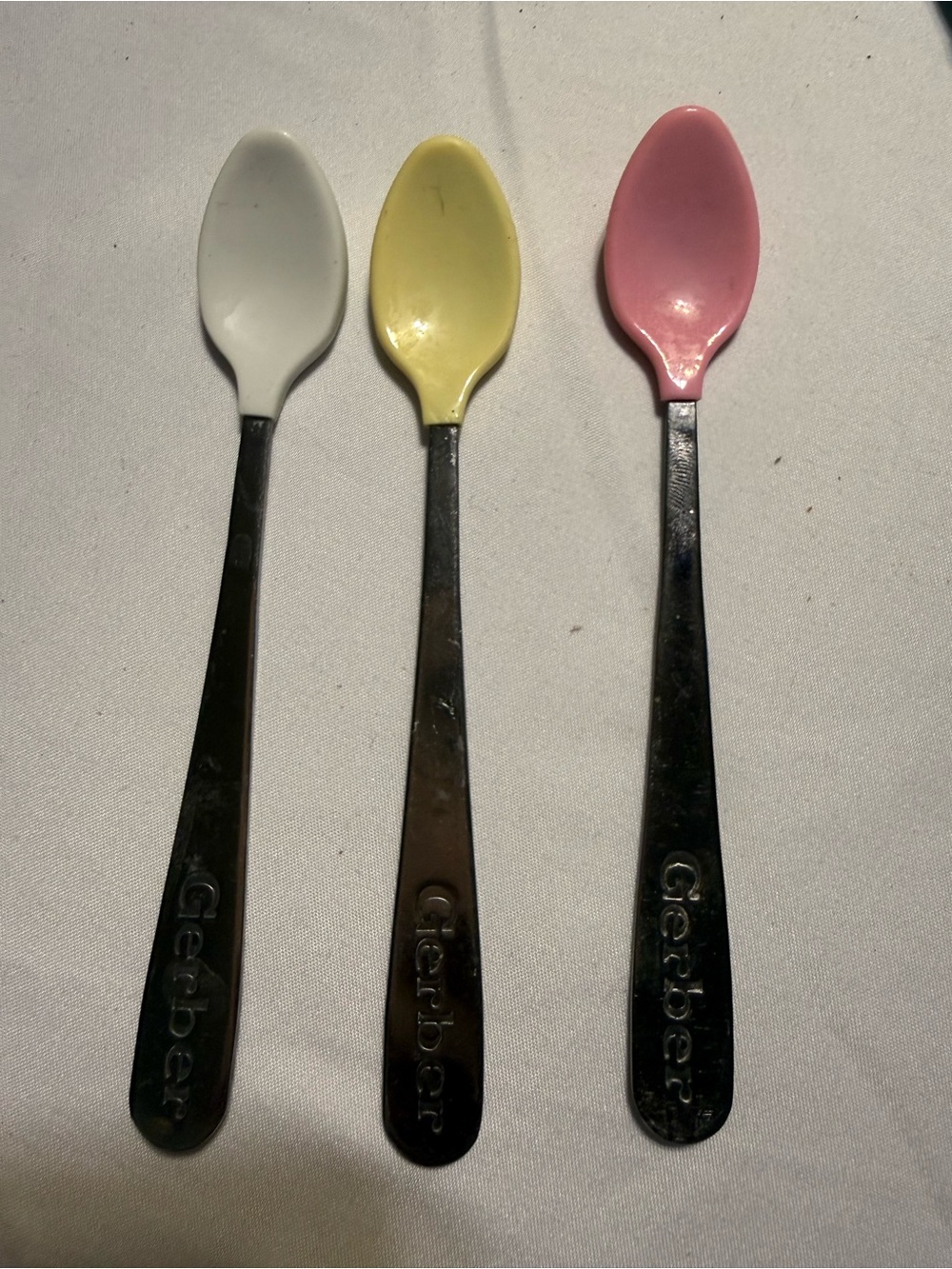 Gerber Stainless Handle Baby Spoons in White, Yellow, Pink